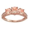 Designs By Gioelli 10k Rose Gold Simulated Morganite & Lab-Created White Sapphire 3-Stone Ring 1 Designs By Gioelli 10k Rose Gold Simulated Morganite & Lab-Created White Sapphire 3-Stone Ring -Designs by Gioelli Shop unnamed file 1039